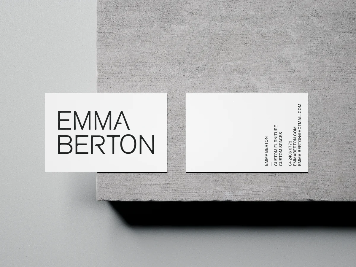 Emma Berton business cards on concrete
